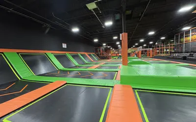 Nova Adventure Park in Garner featuring a giant multi-level indoor playground with colorful slides and climbing structures.
